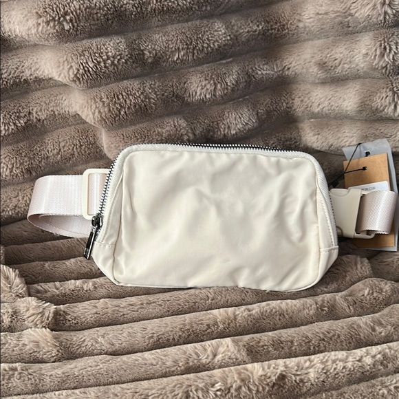 ampere creations Handbags - Cream Minimalist Belt Bag with Zipper Closure